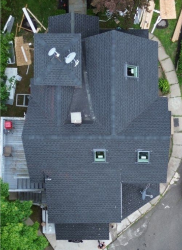 asphalt roof with skylights in bennington vt installed by Northland Roofing LLC